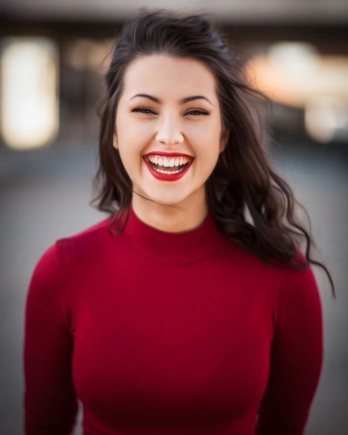 Amara, founder and makeup artist, smiling